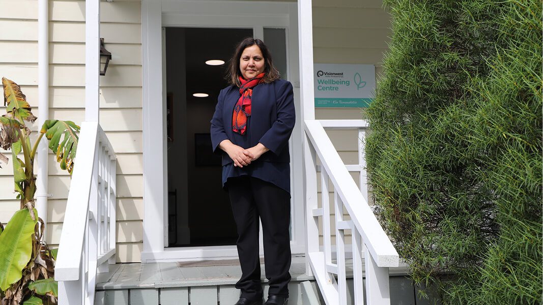 Woman standing outside Wellbeing centre