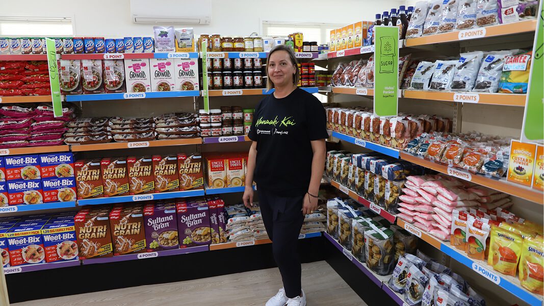 Woman standing in supermarket