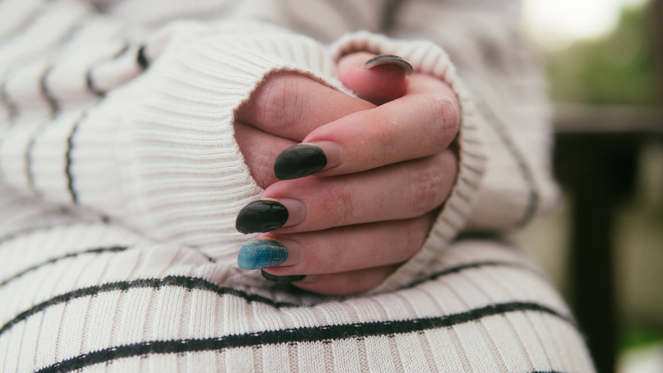 Woman's hands in lap