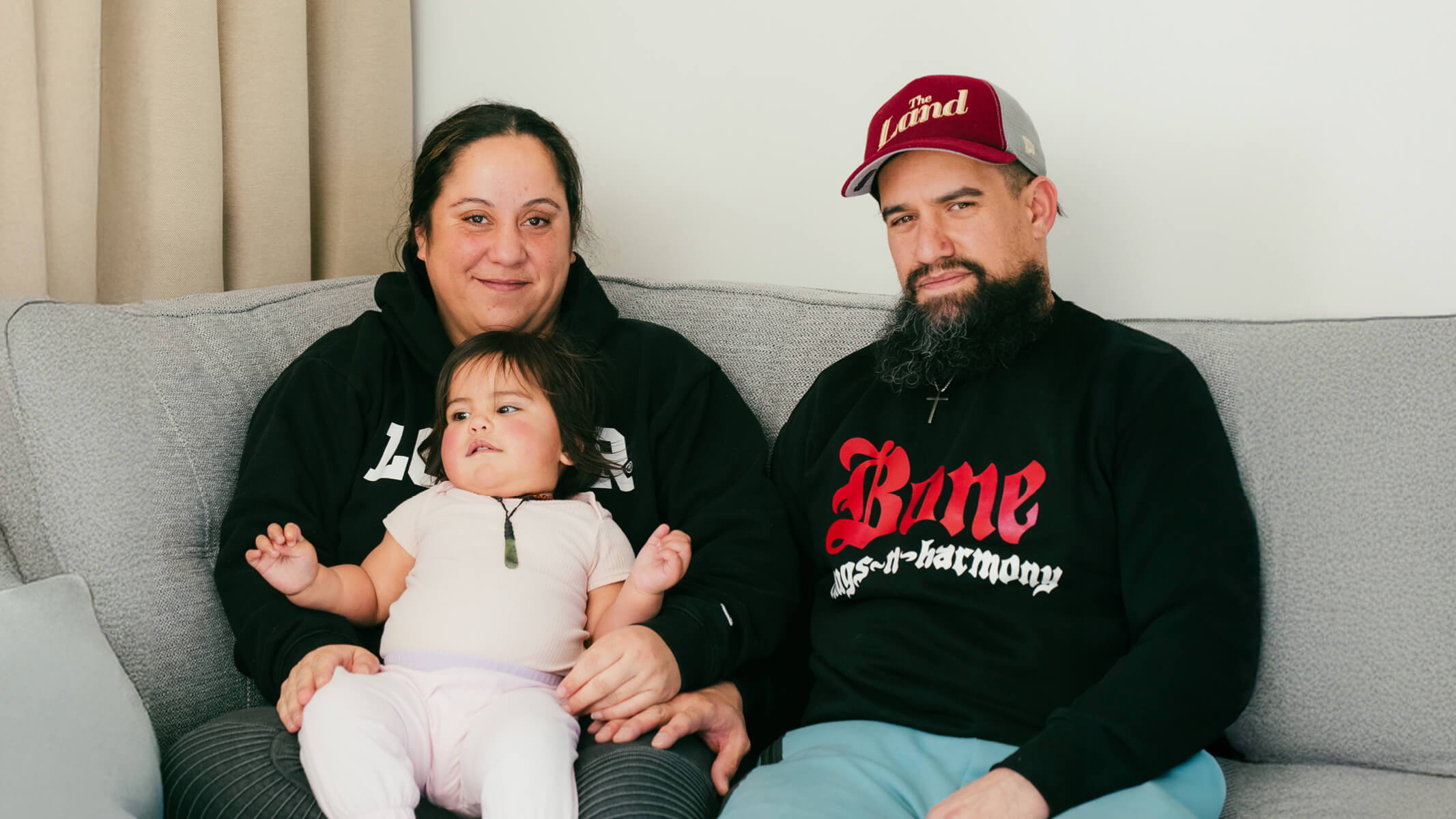 Family sitting on couch