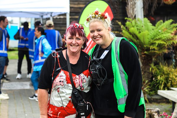 Two women dressed up for Christmas